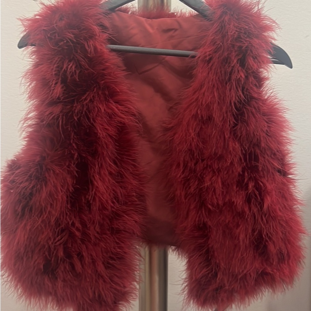 Women feather vest